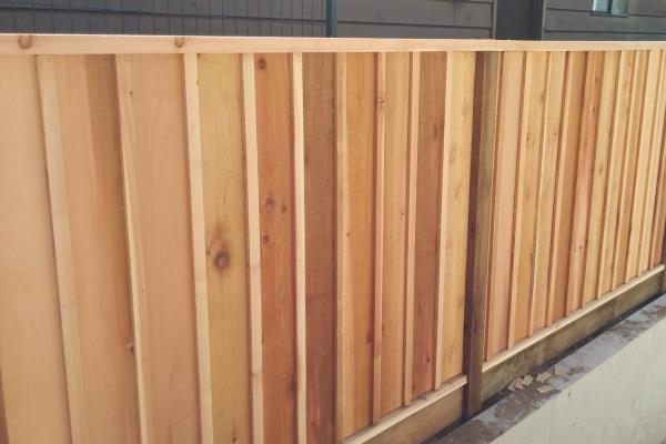 wood board and batten style fence