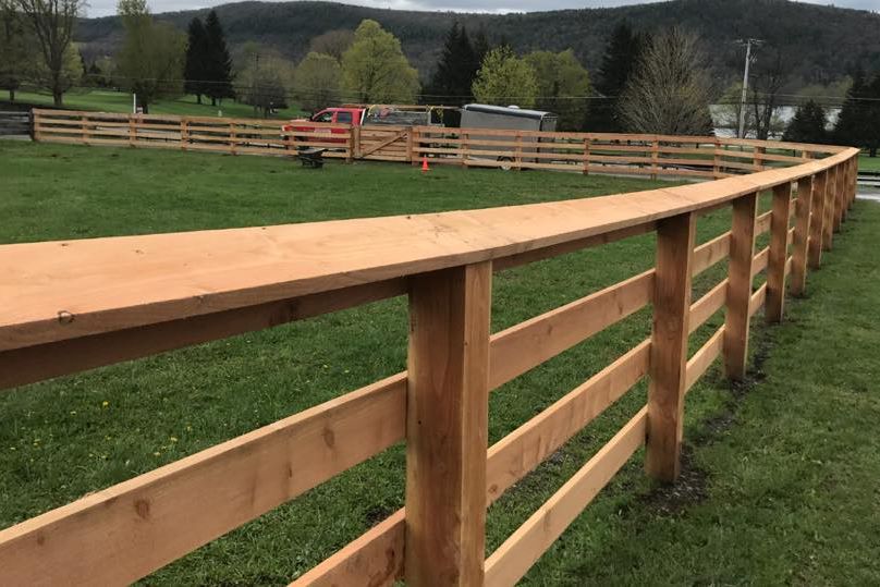 wood post and board style fence