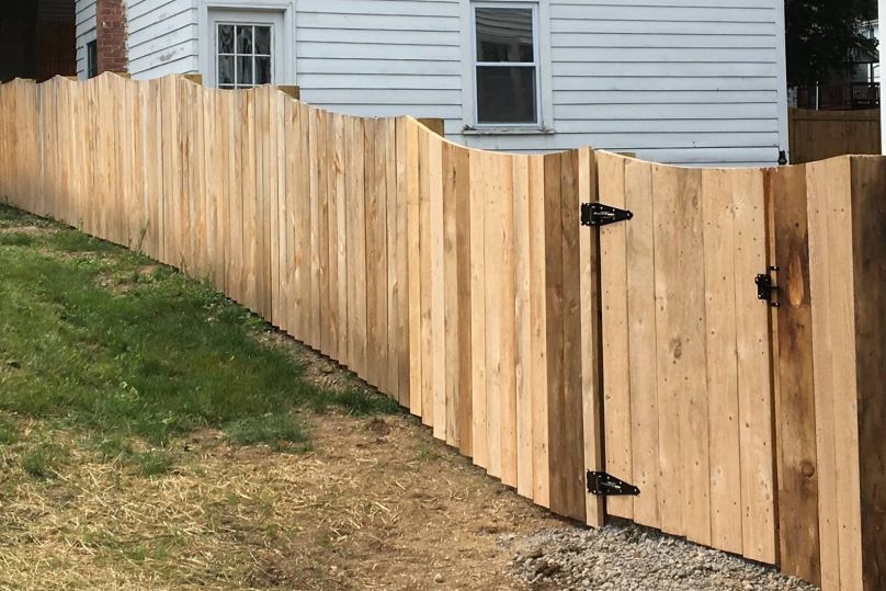 wood scalloped style fence